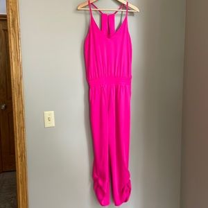 A New York (boutique brand) jumpsuit in hot pink